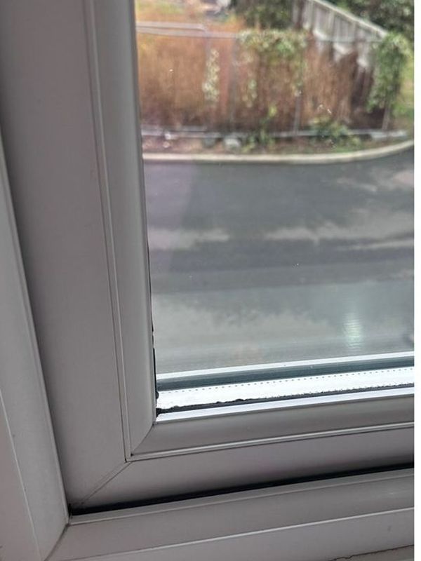 After: the uPVC window frame cleaned back to bright white